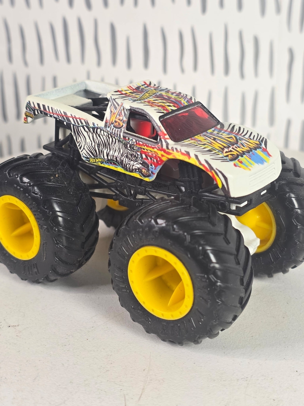 Zebra-Graphic White Monster Truck Toy with Yellow Wheels